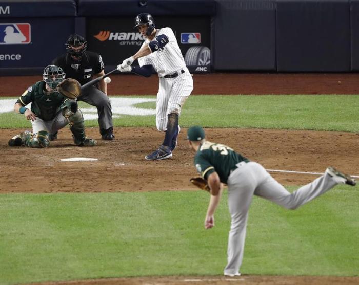 Yankees despachan a Atléticos y jugarán contra Medias Rojas en la serie divisional